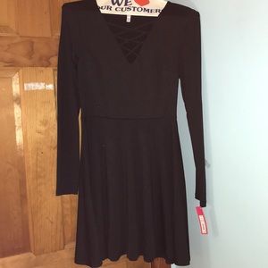Black dress. NEVER WORN STILL HAS TAGS.